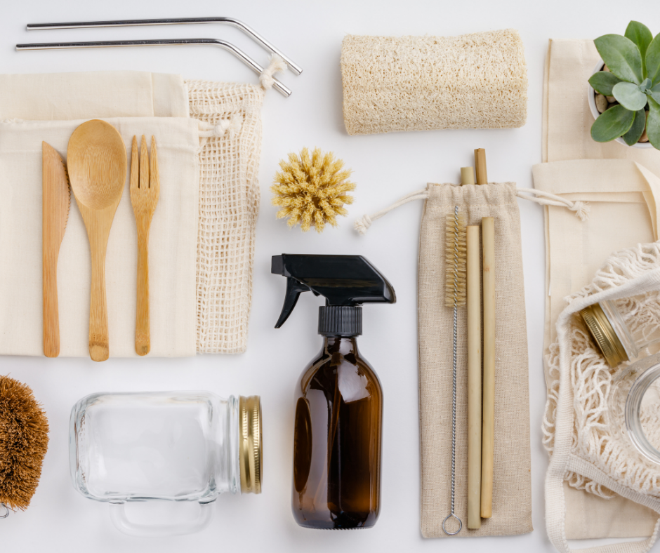 Zero waste items including a reusable brown spray bottle, wodden cutlery, a loofa, metal straws, a glass jar Zero waste items including a reusable brown spray bottle, wodden cutlery, a loofa, metal straws, a glass jar