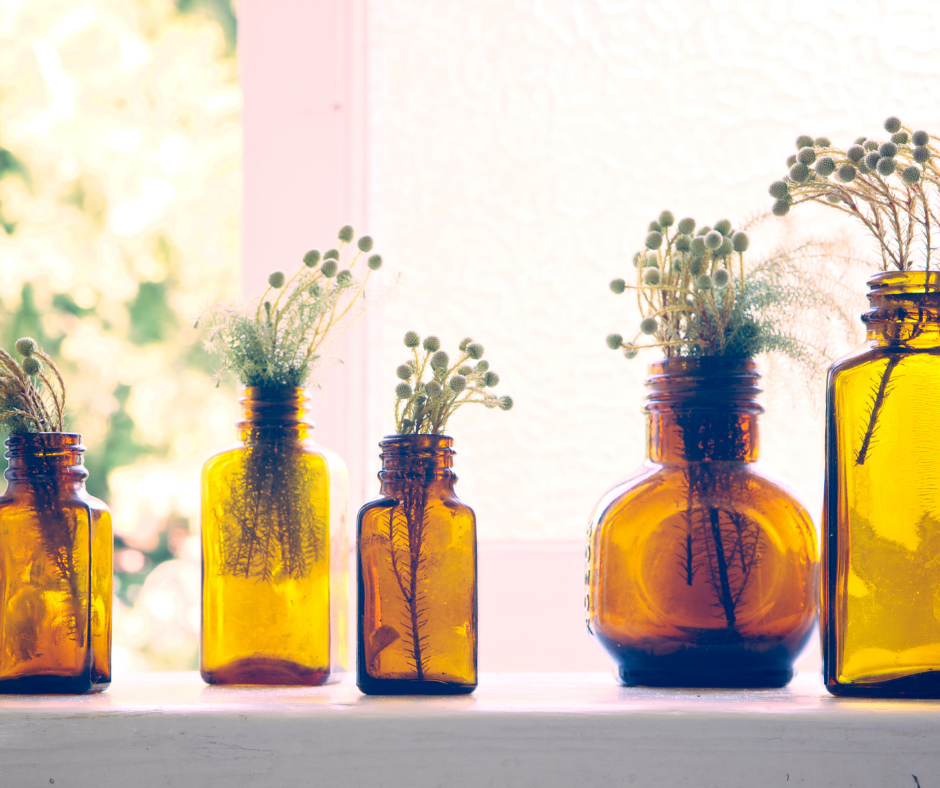 Brown bottles upcycled into herb vases Brown bottles upcycled into 5 plant herb vases