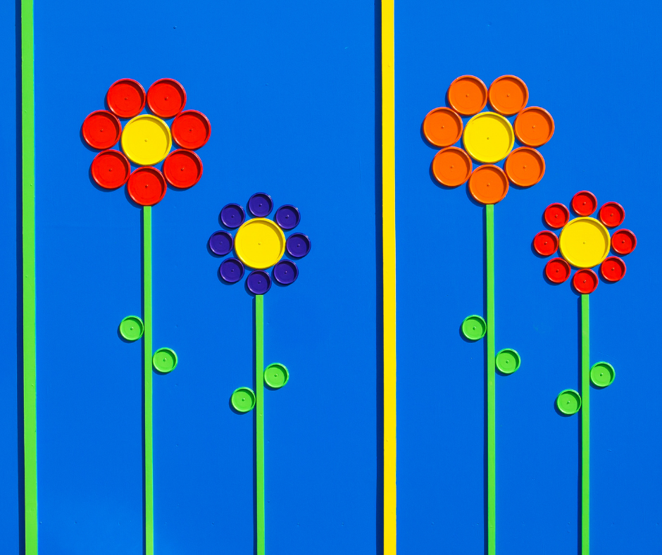 Art made from old plastic bottle tops in the shape of flowers Art made from old plastic bottle tops in the shape of flowers