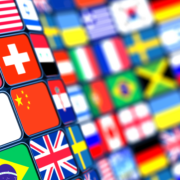 All the world's flags. The flags on the left side are clear. The flags on the right side are blurred. This is because the flags are shown like a wave.