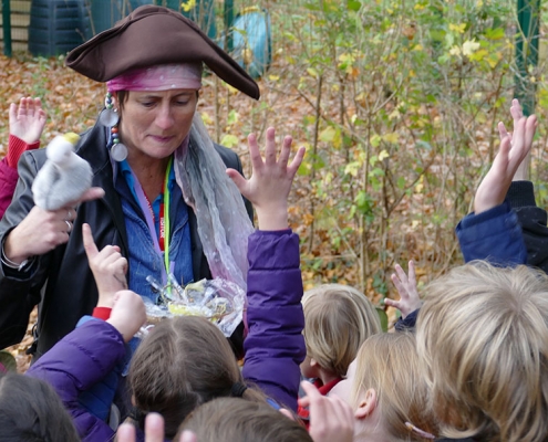 Waste Educator dressed as a Pirate and teaching children about plastic pollution