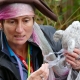 A waste educator dressed as a Pirate holding a seal toy and plastic