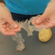 Hands holding a sample of bioplastic