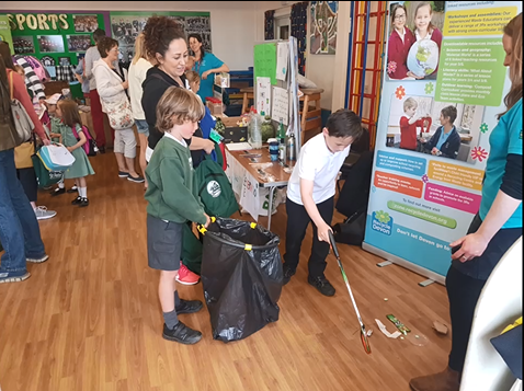 st peters2 picture of school pupils at St Peters Primary in Budleigh enjoying a litter picking game with the Devon waste education team