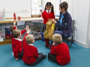 Workshops Small group of children with waste educator sally and the rubbish feely bag, part of materials workshop